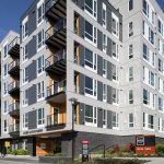 Exterior of modern 6-story apartment building