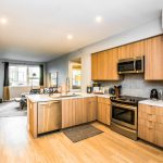 Apartment interior with open kitchen and living room