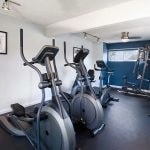 Fitness center with exercise equipment.
