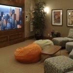 Theatre room with chairs and bean bags.