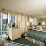 Interior of bedroom and view of the balcony.