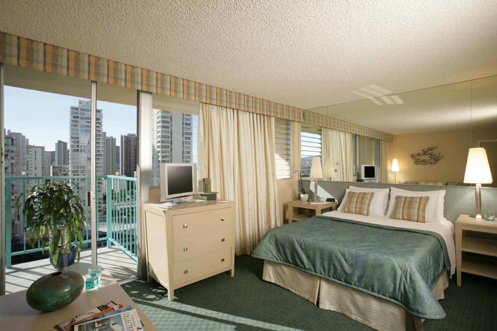 Interior of bedroom and view of the balcony.