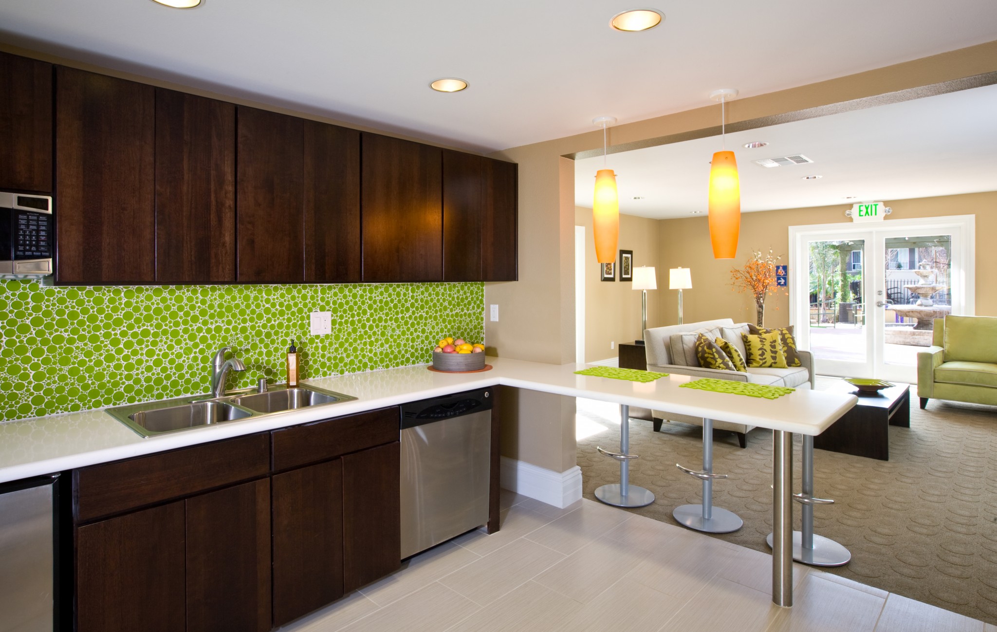 Interior of the clubhouse from the kitchen area looking at the living room area.
