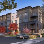 Exterior of 4-story apartment building with parking lot, cross walk and concrete stairs in foreground