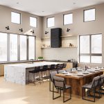 Interior of large, open, shared kitchen area with dining table and countertop seating
