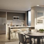 Interior of modern apartment with open kitchen and dining area