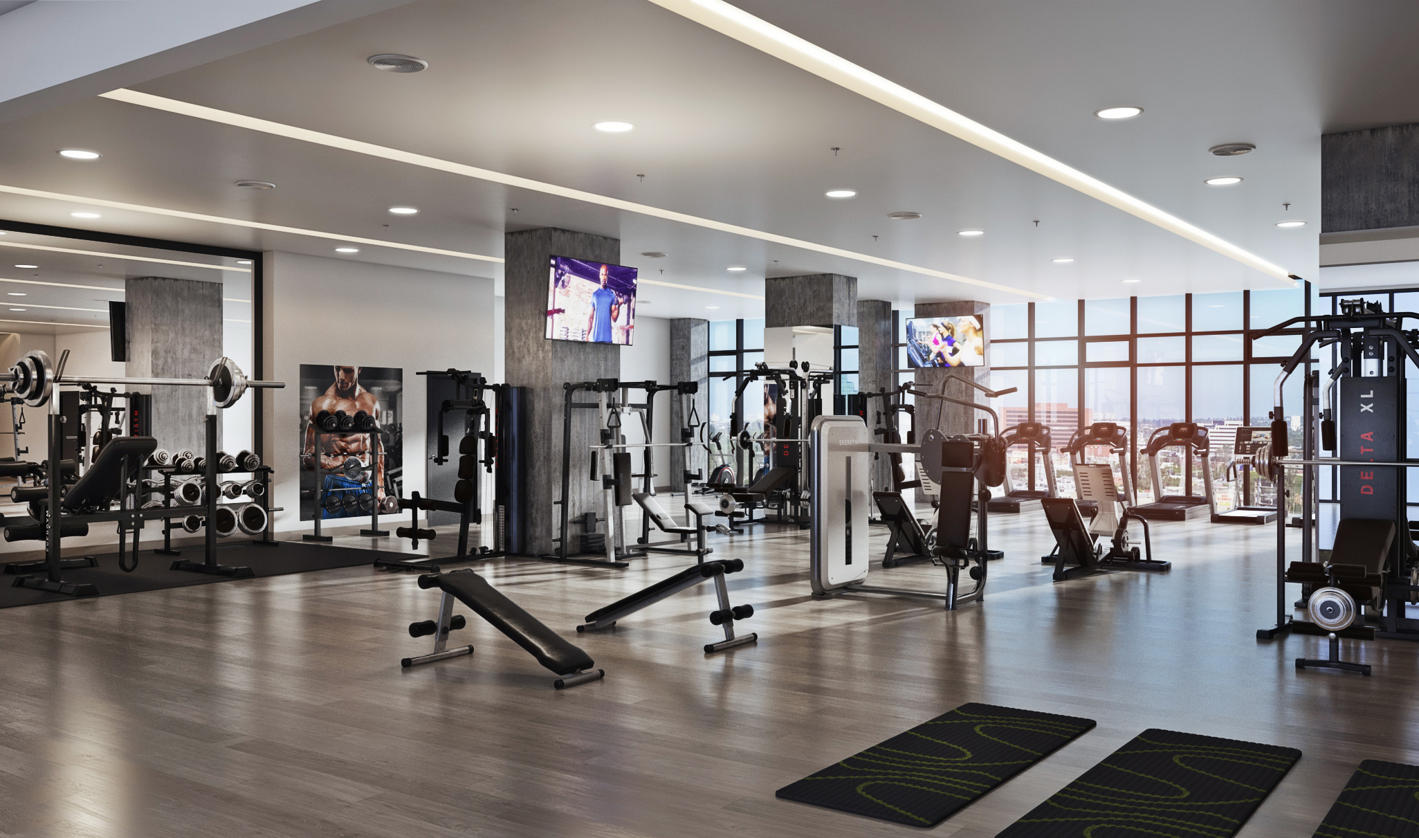 Interior of well appointed gym with city views through wall of windows