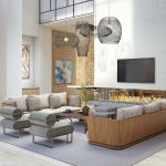 Interior of modern clubroom with open fireplace, couches, and chairs