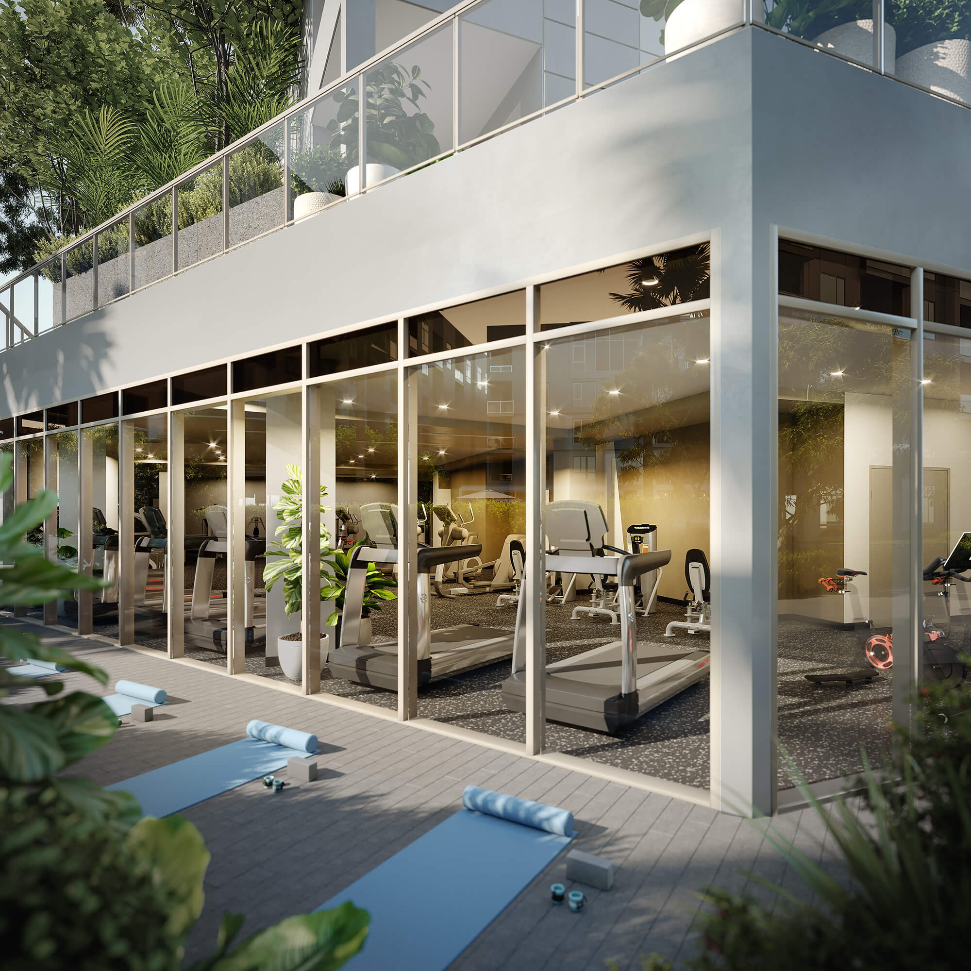 Exterior looking into fitness room with yoga mats in foreground