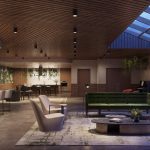 Modern open interior with bar seating and couches