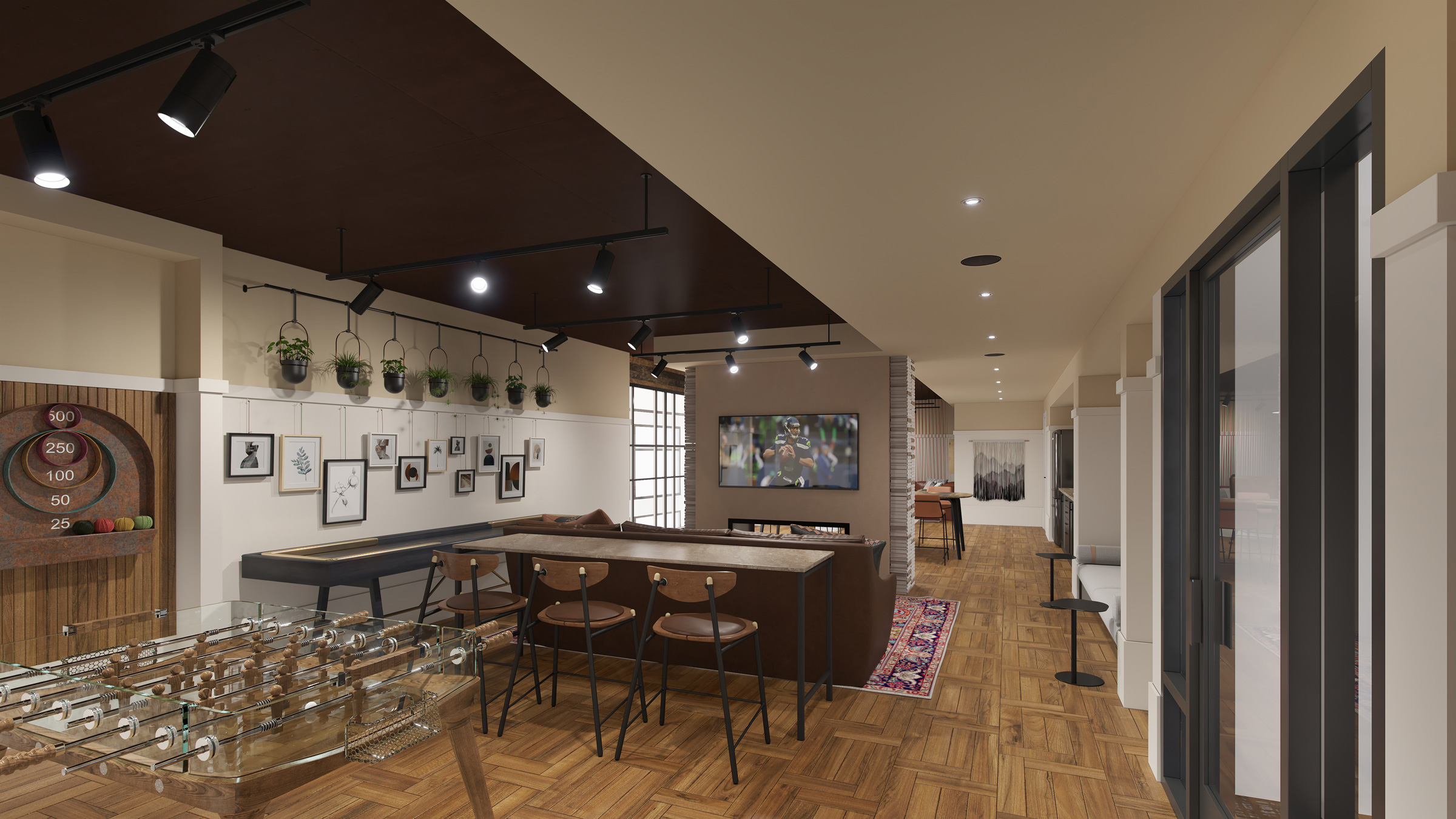 Interior game room with foosball table and seating area