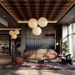 Interior of modern lobby with seating area and high ceilings