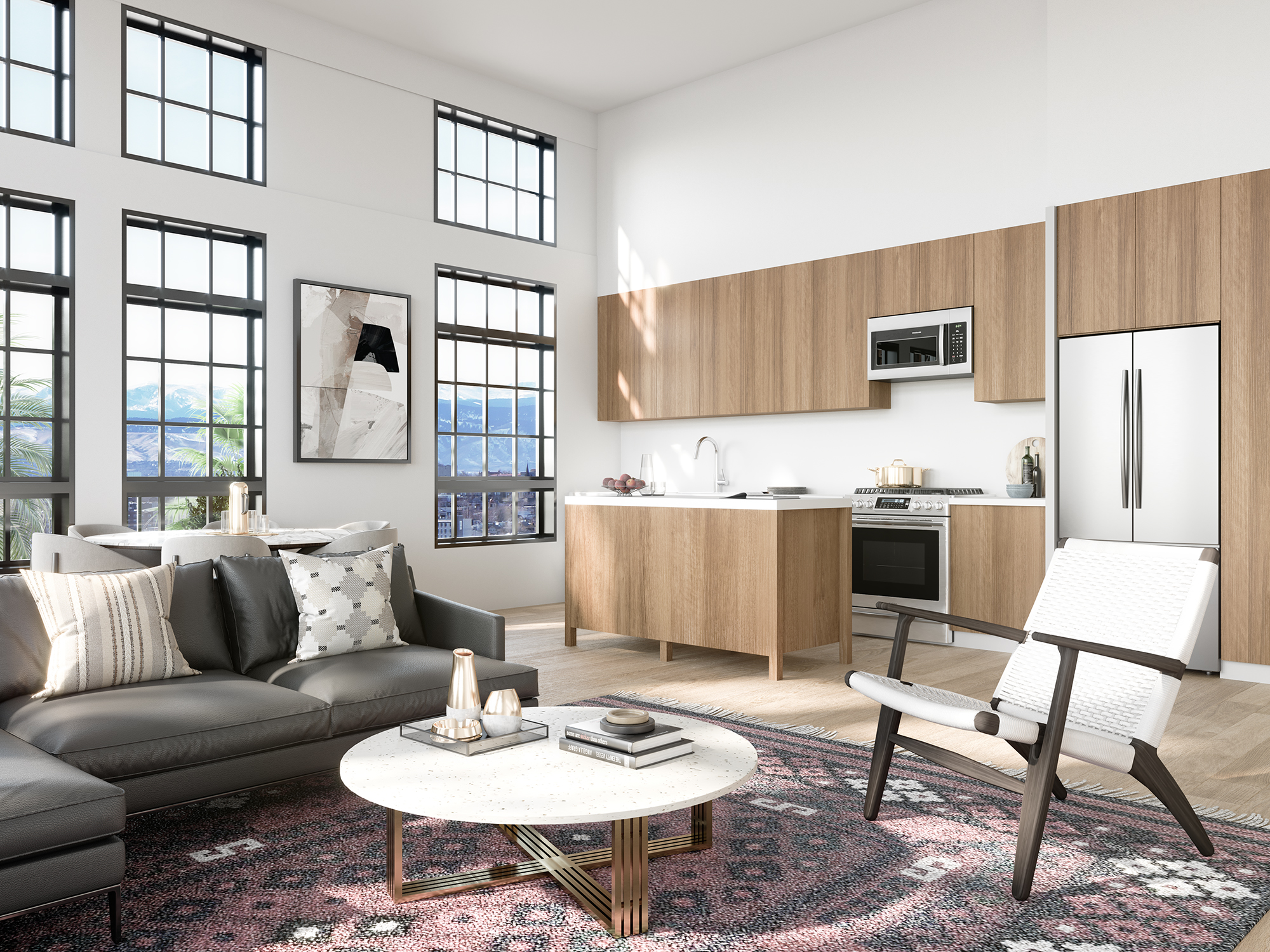 Interior of apartment with open kitchen and living room couch in the foreground