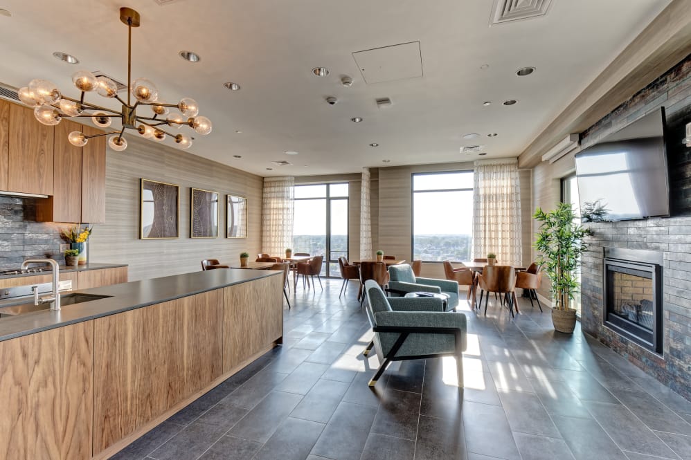Private dining area with fireplace and open kitchen