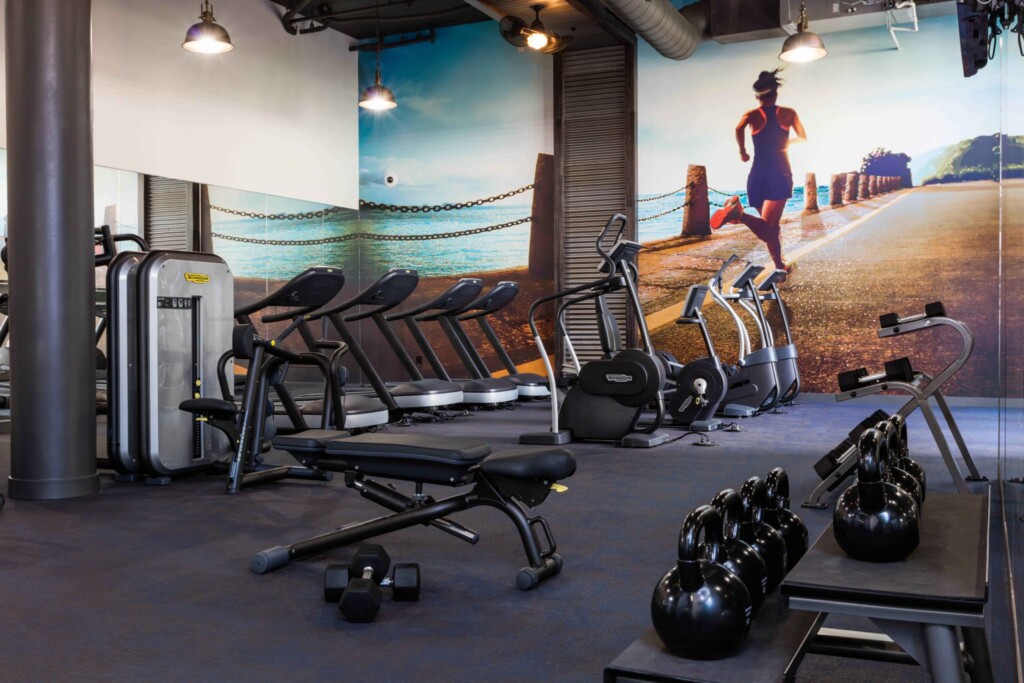 Interior of fitness center with kettle bell weights and exercise machines