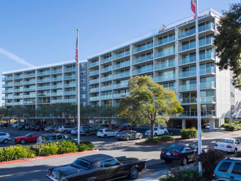 Exterior of 8-story apartment building.