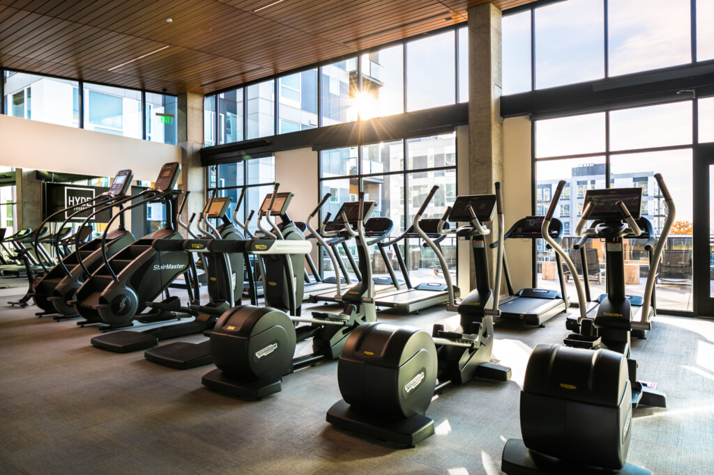 Interior of large fitness center with various exercise machines