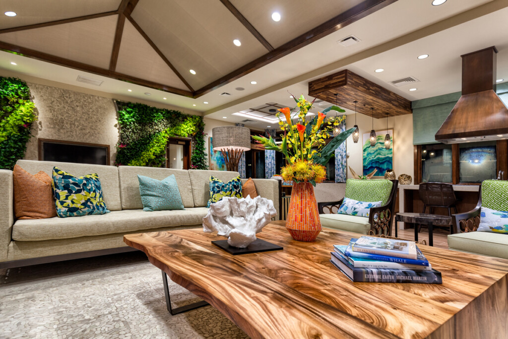 Interior of seating area with couch, chairs, and coffee table.