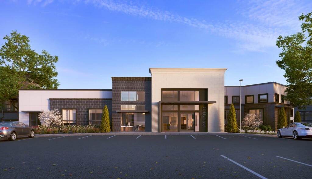 Exterior of single-story entrance with parking lot in foreground